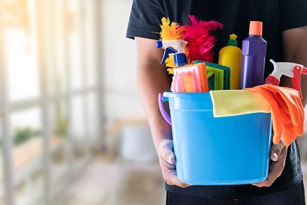housekeeping supplies being carried by a maid